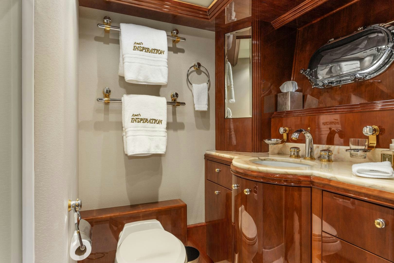 a bathroom with a sink and towels aboard ANA’S INSPIRATION Yacht for Sale