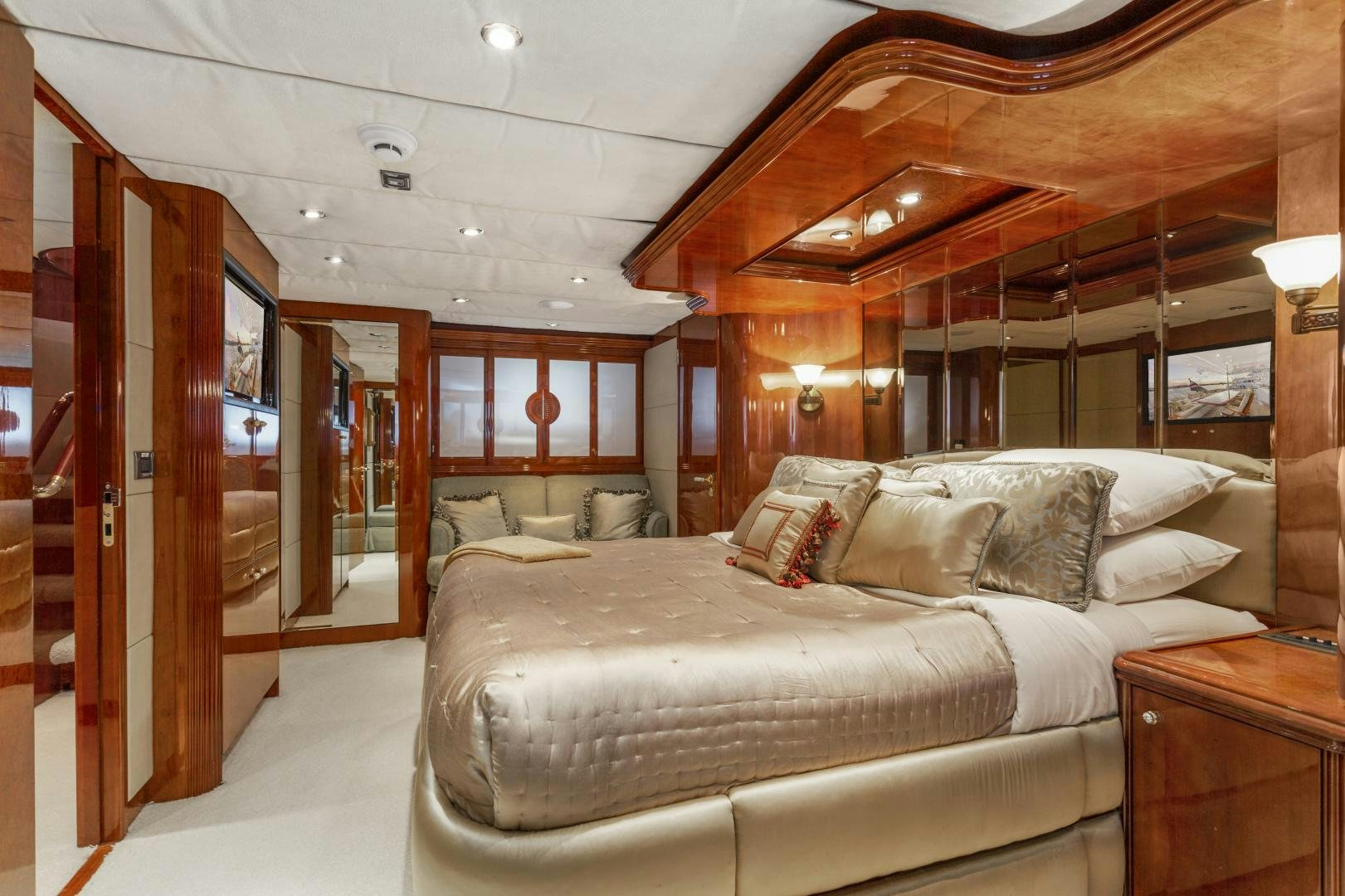 a large bed in a room aboard ANA’S INSPIRATION Yacht for Sale