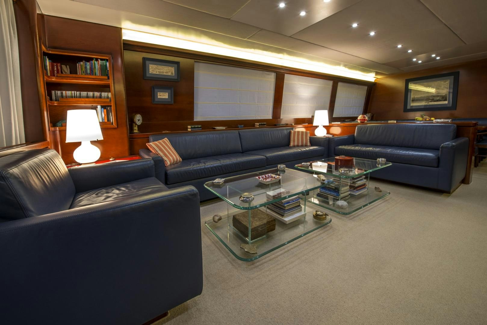 a living room with a couch and a coffee table aboard GIOIA 1 Yacht for Sale