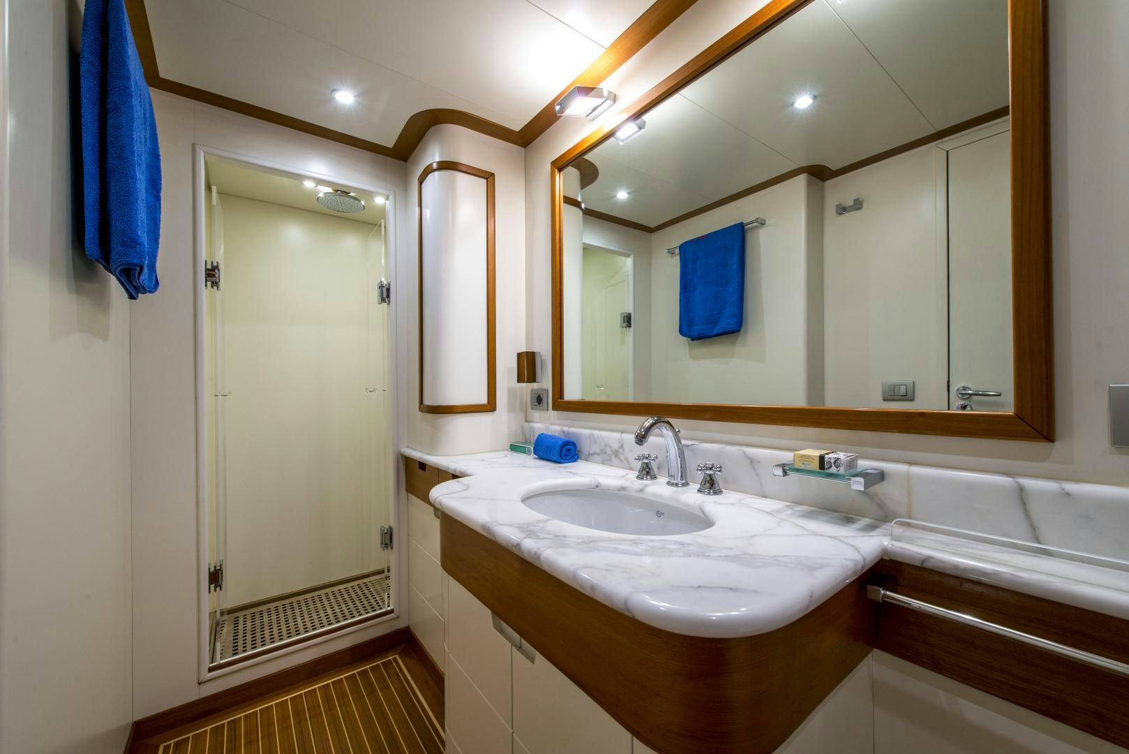 a bathroom with a large mirror aboard GIOIA 1 Yacht for Sale
