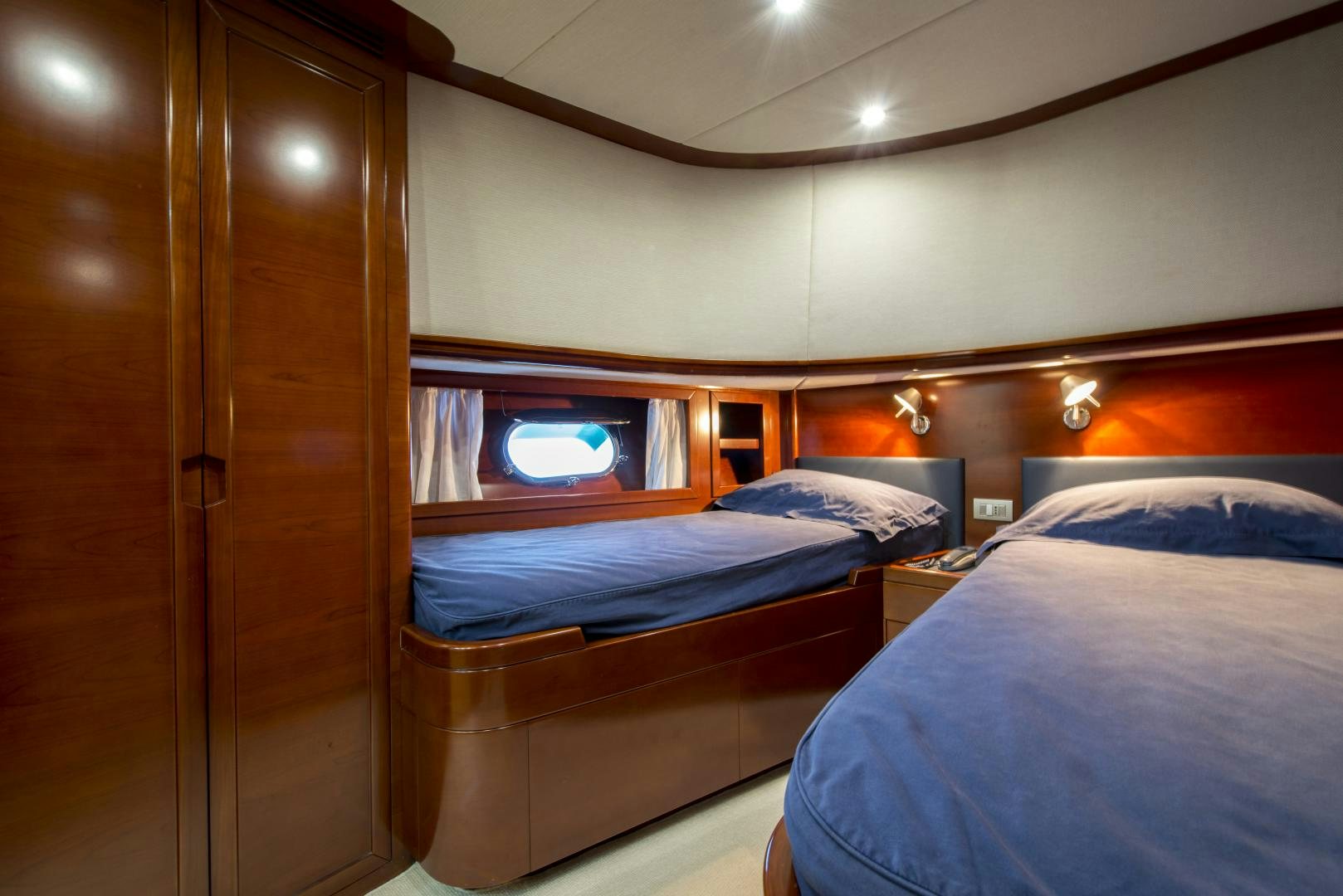 a room with two beds aboard GIOIA 1 Yacht for Sale