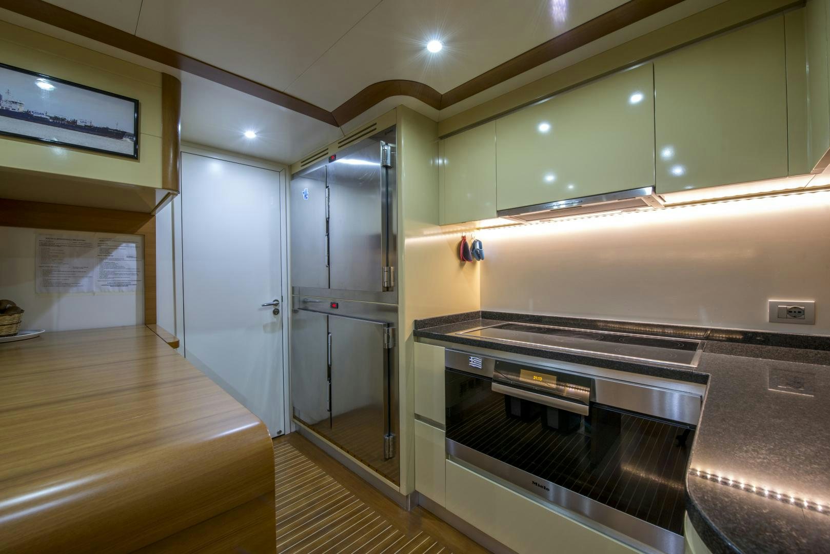 a kitchen with a large oven aboard GIOIA 1 Yacht for Sale
