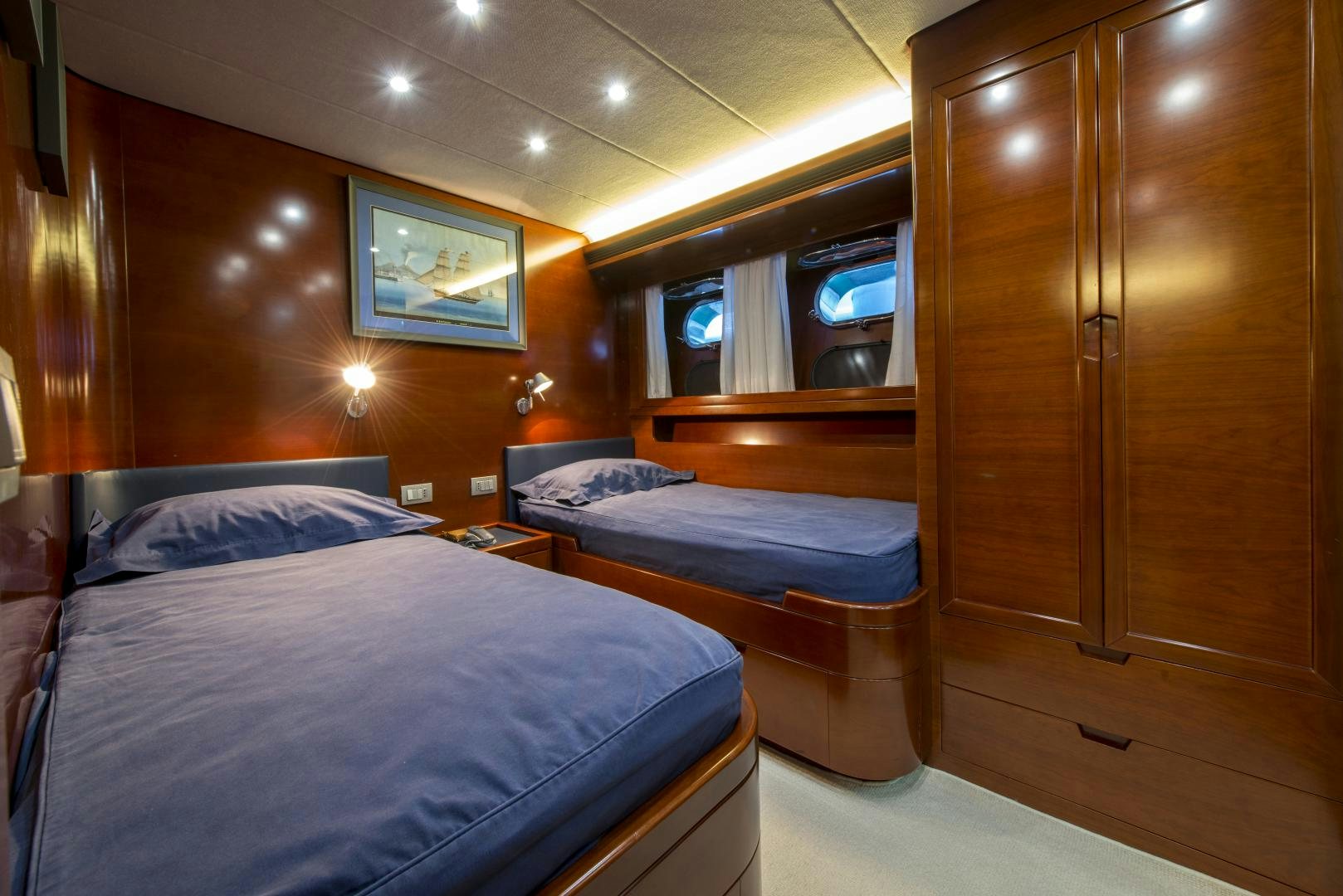 a room with two beds aboard GIOIA 1 Yacht for Sale