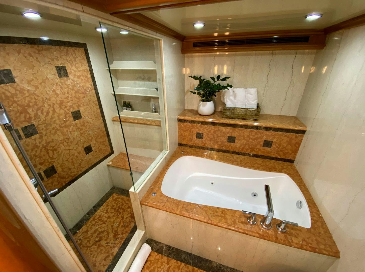 a bathroom with a large bathtub aboard BLUE STEELE Yacht for Sale