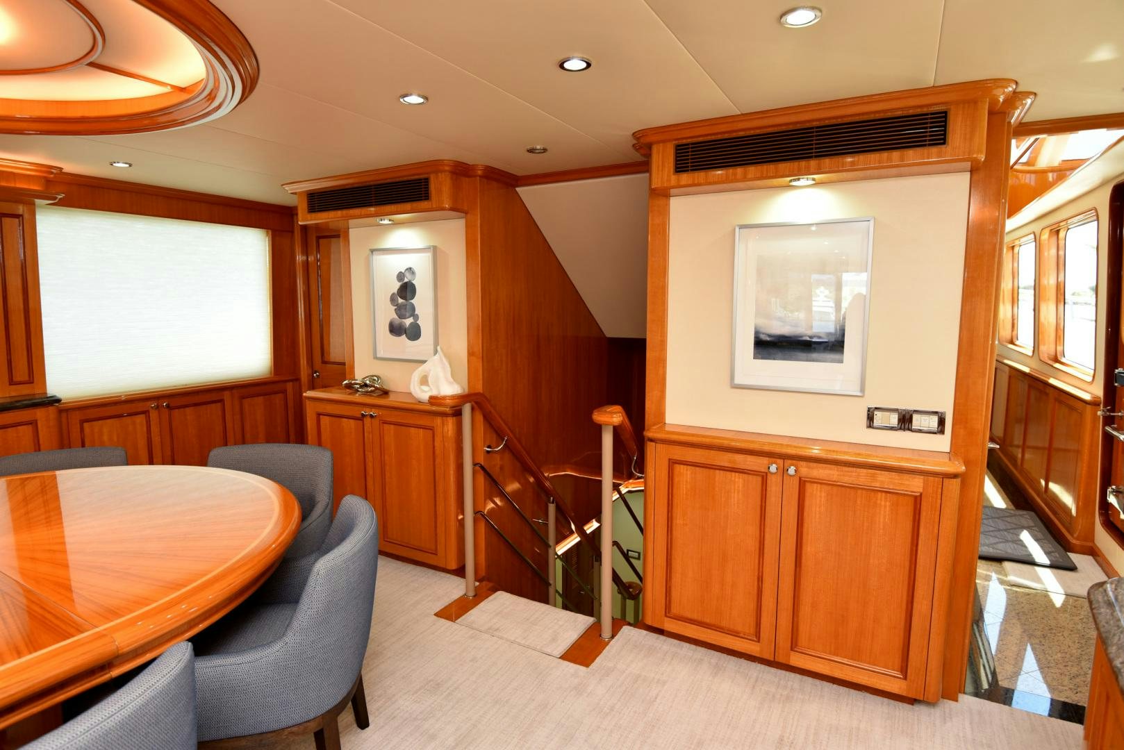 a room with a table and chairs aboard BLUE STEELE Yacht for Sale