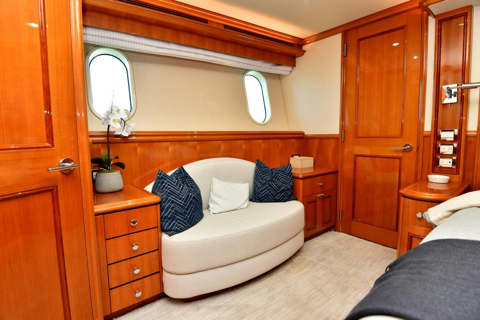 a bedroom with a bed and a desk aboard BLUE STEELE Yacht for Sale