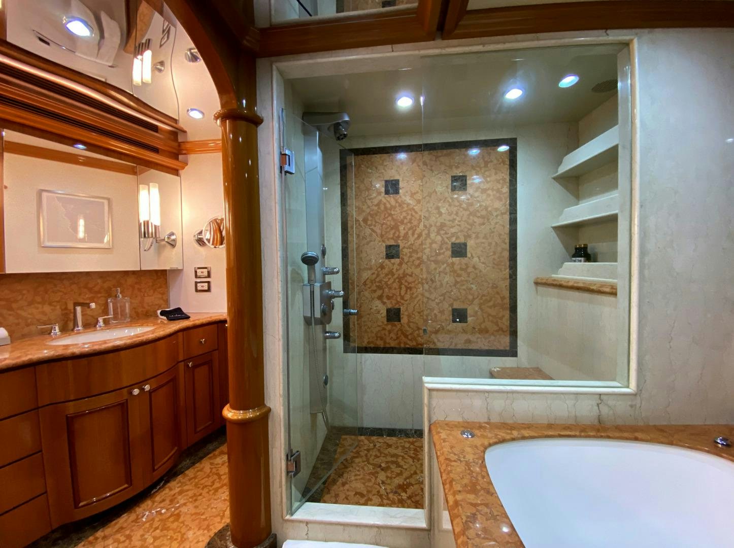 a bathroom with a large mirror aboard BLUE STEELE Yacht for Sale