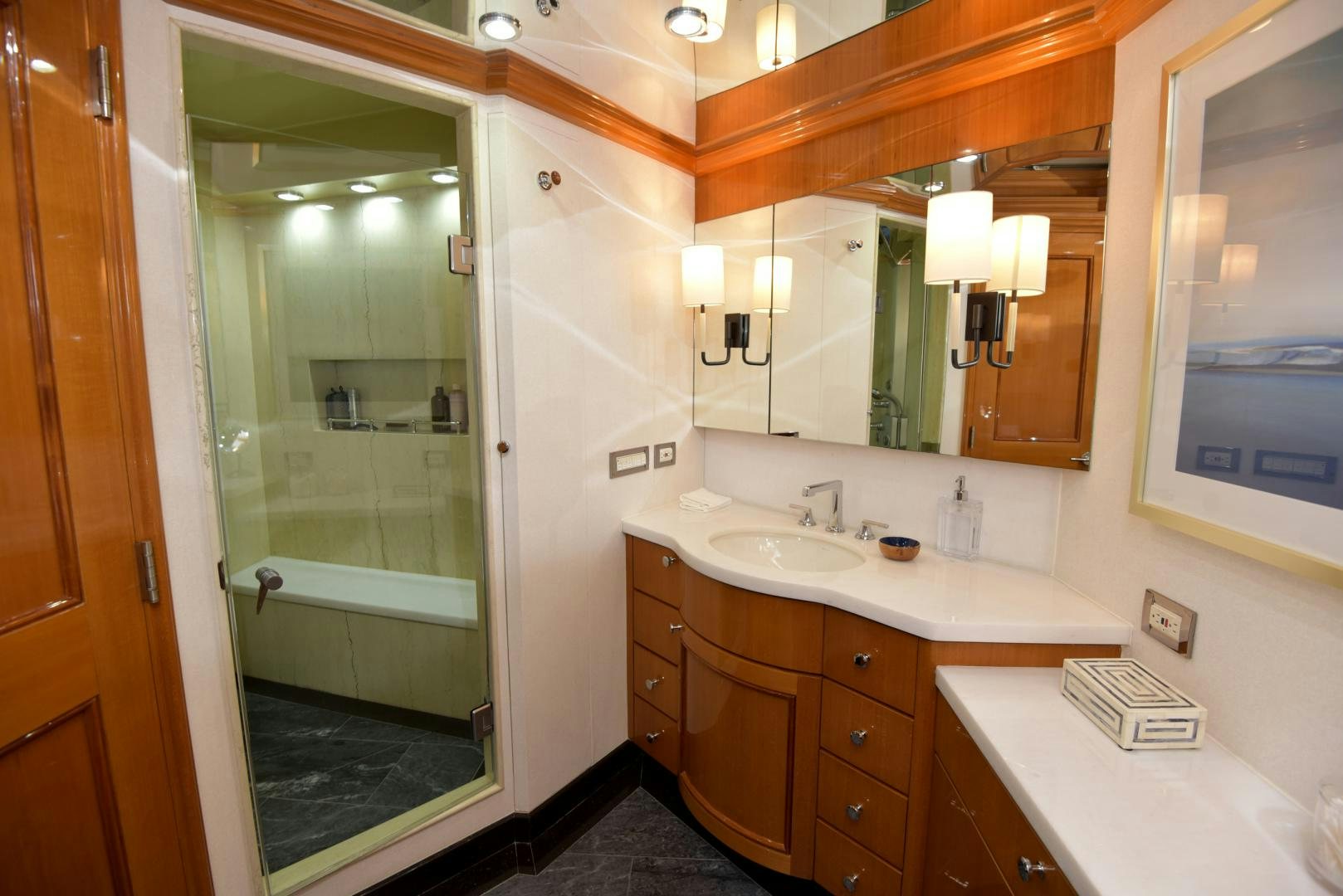 a bathroom with a sink and a mirror aboard BLUE STEELE Yacht for Sale