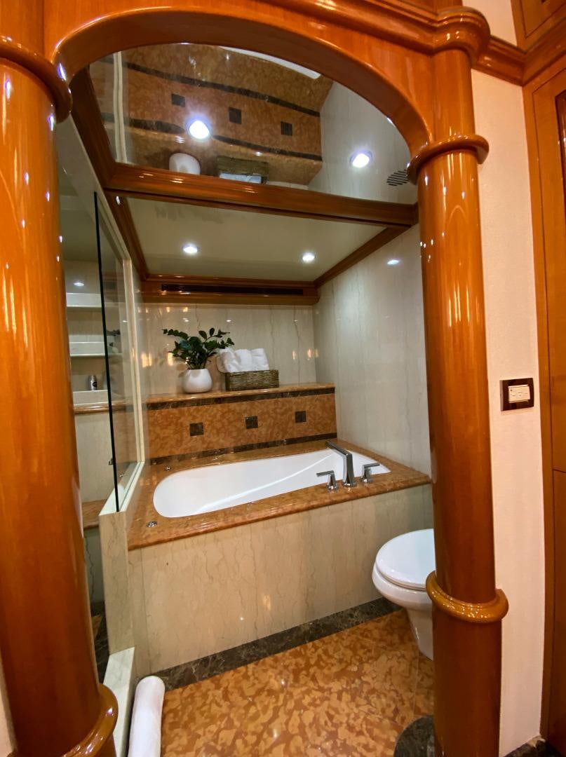 a bathroom with a large mirror aboard BLUE STEELE Yacht for Sale
