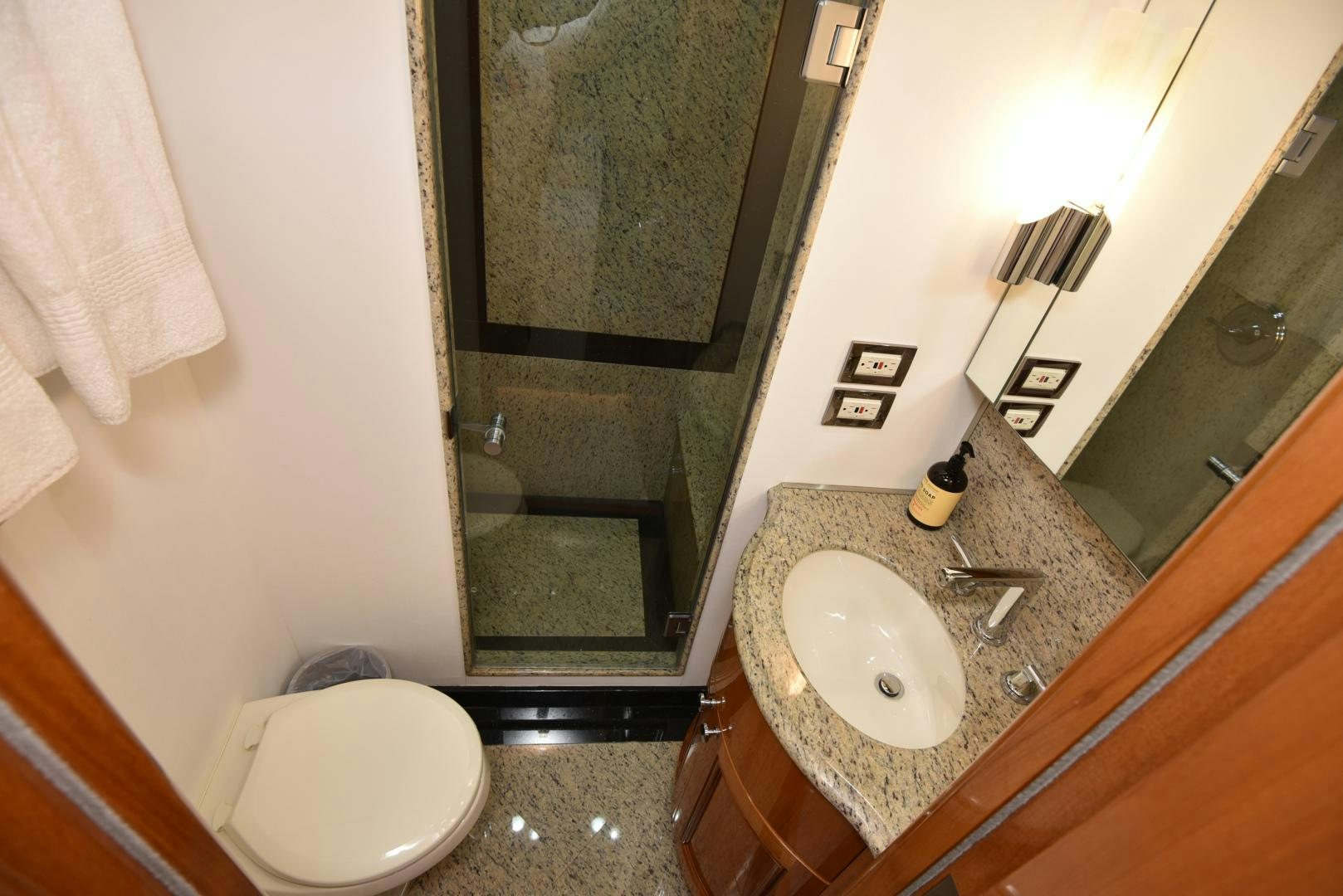 a bathroom with a sink and a toilet aboard BLUE STEELE Yacht for Sale