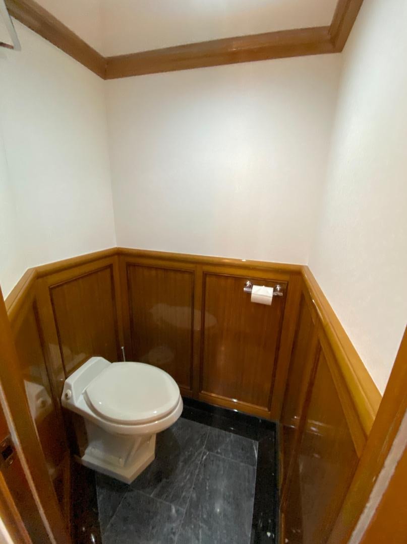 a toilet in a bathroom aboard BLUE STEELE Yacht for Sale