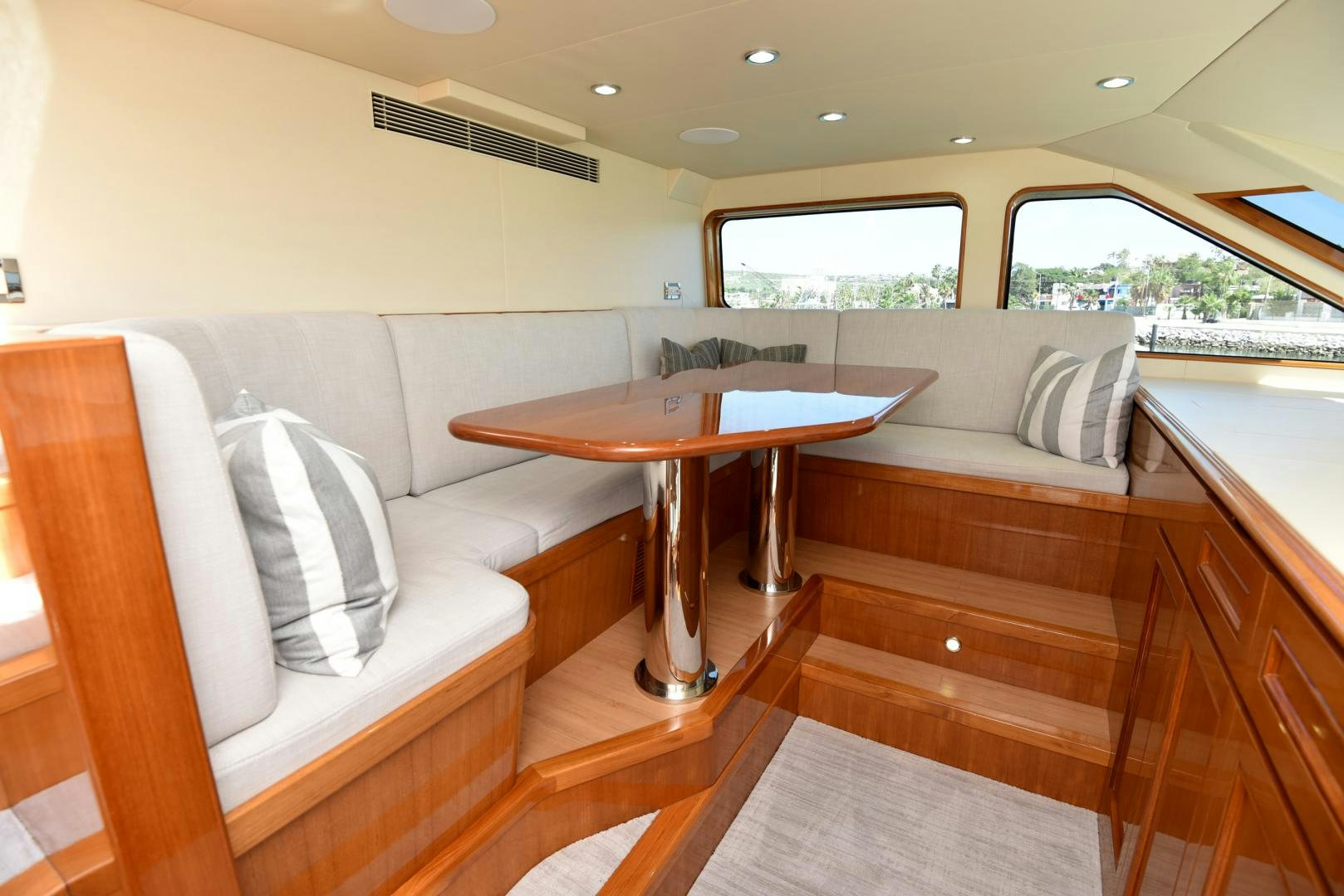 a living room with a couch and a table aboard BLUE STEELE Yacht for Sale