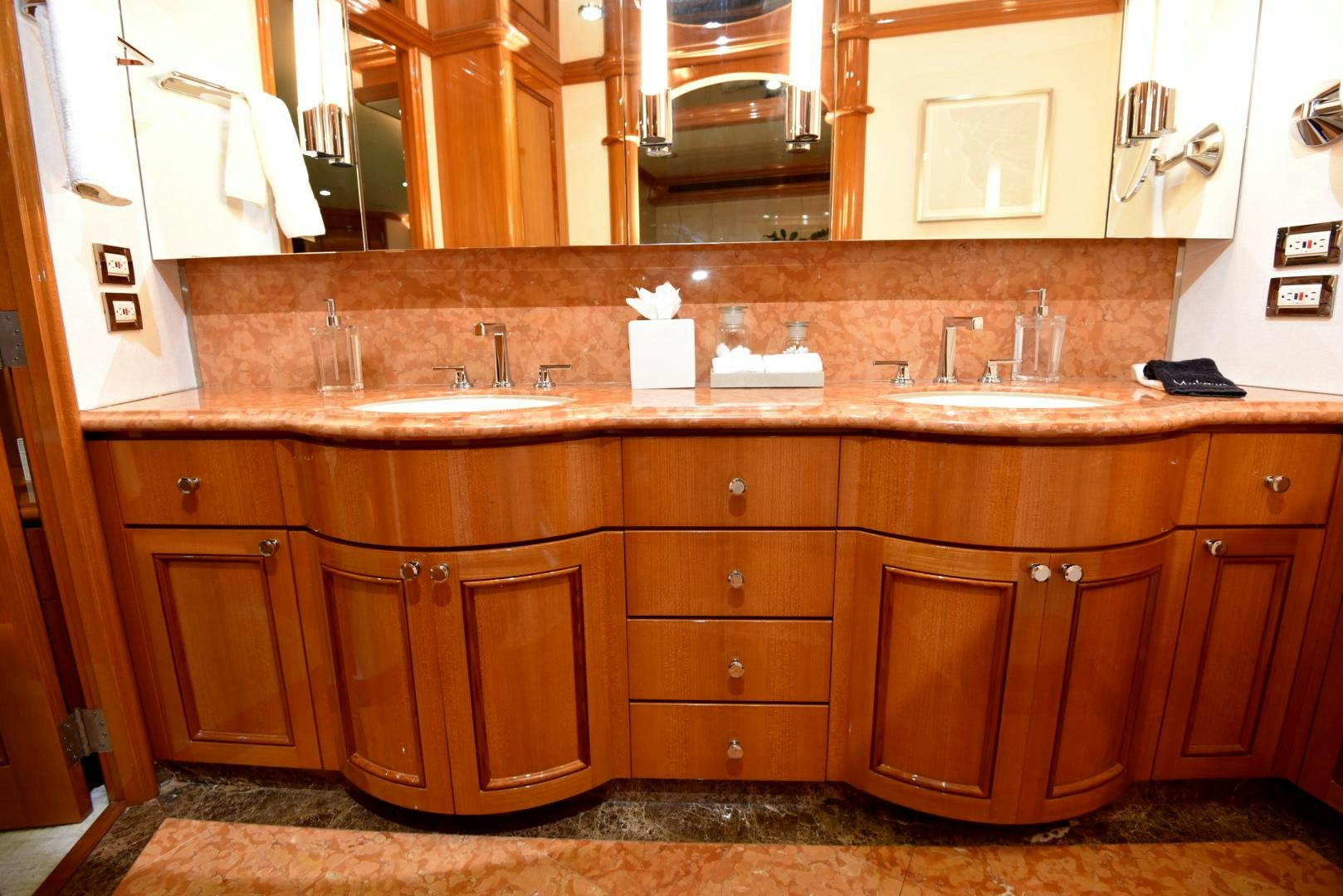 a kitchen with wooden cabinets aboard BLUE STEELE Yacht for Sale