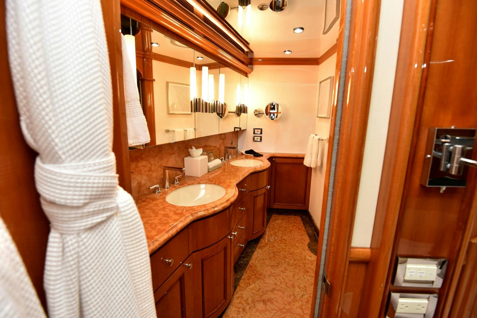 a bathroom with a sink and a mirror aboard BLUE STEELE Yacht for Sale