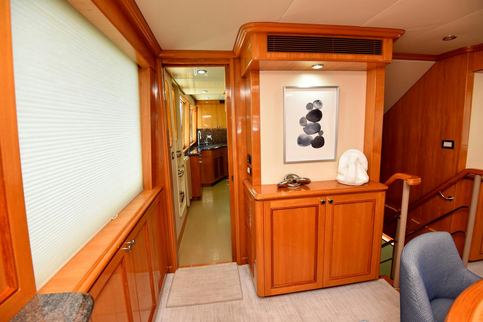 a wood cabinet in a room aboard BLUE STEELE Yacht for Sale