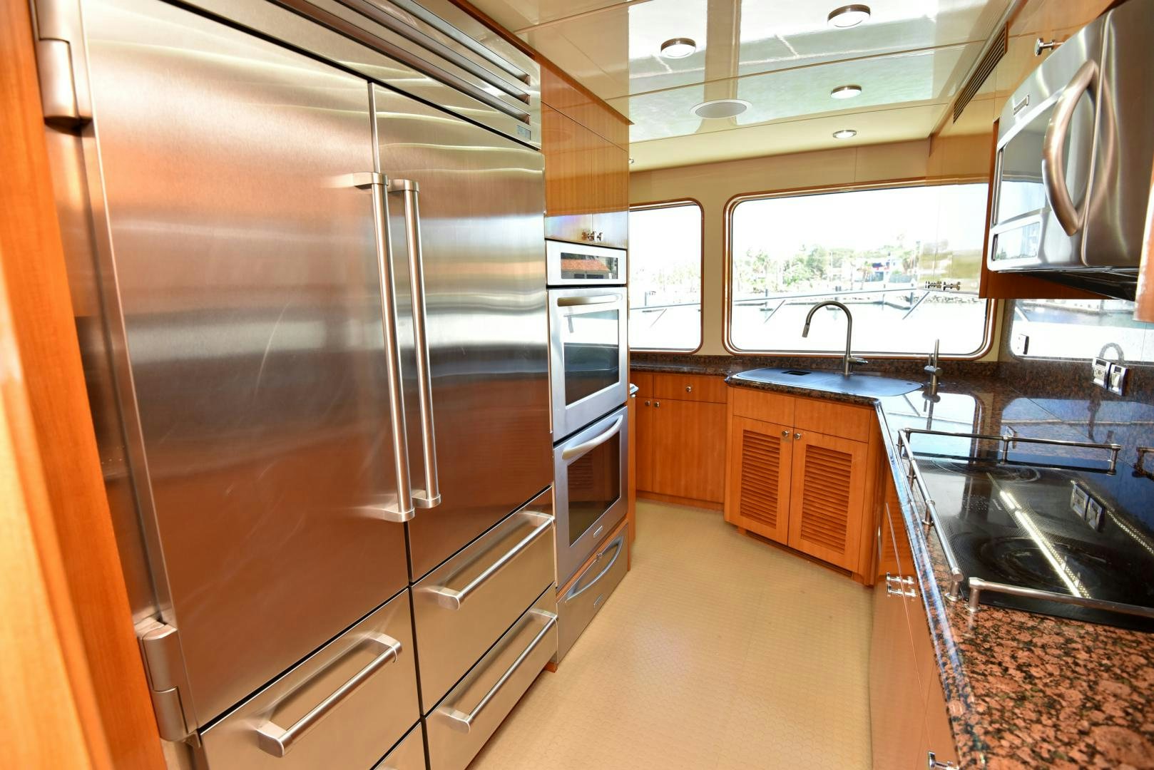 a kitchen with stainless steel appliances aboard BLUE STEELE Yacht for Sale