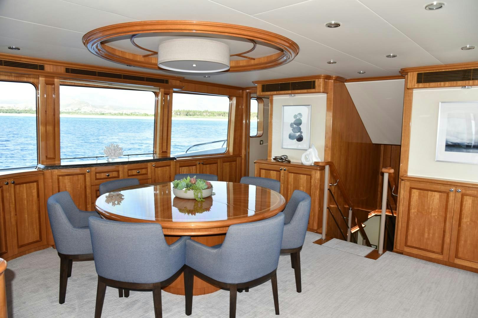 a dining table in a room aboard BLUE STEELE Yacht for Sale