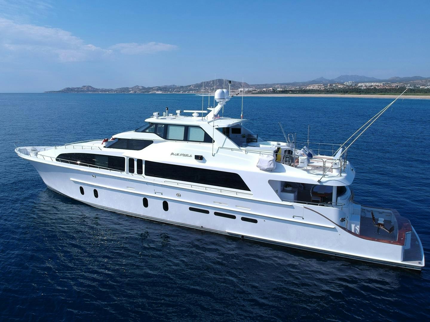 a white yacht in the water aboard BLUE STEELE Yacht for Sale