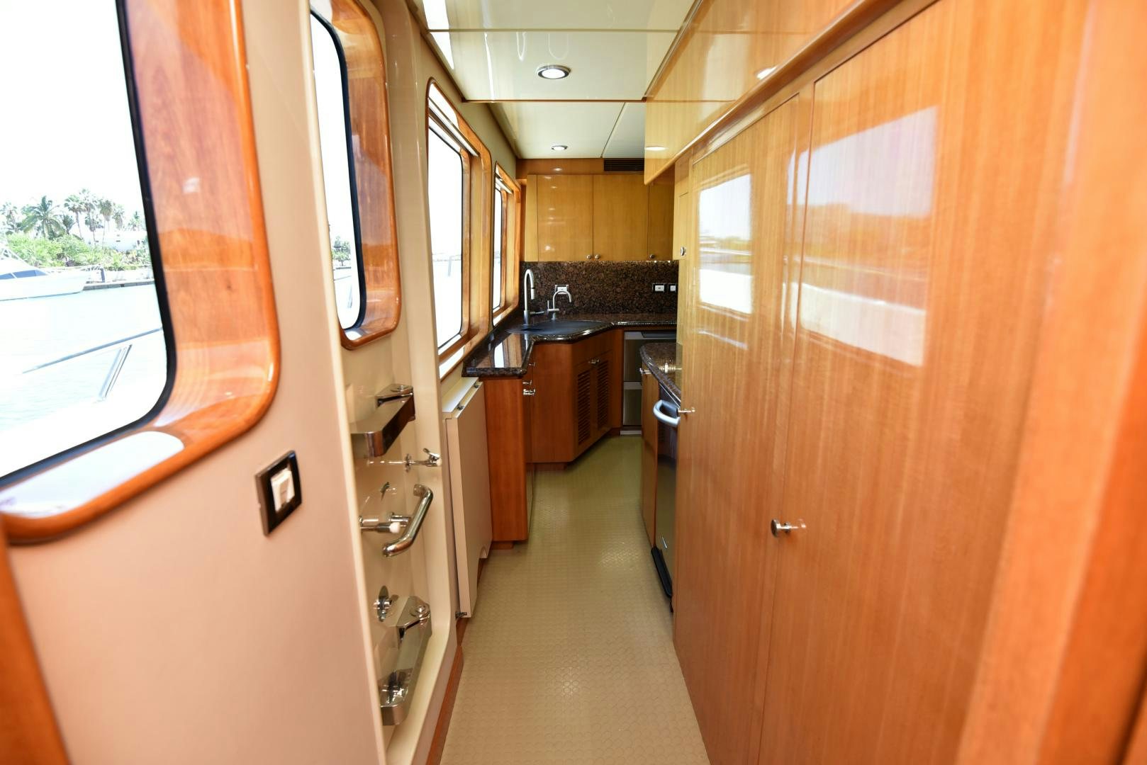 a hallway with doors and windows aboard BLUE STEELE Yacht for Sale