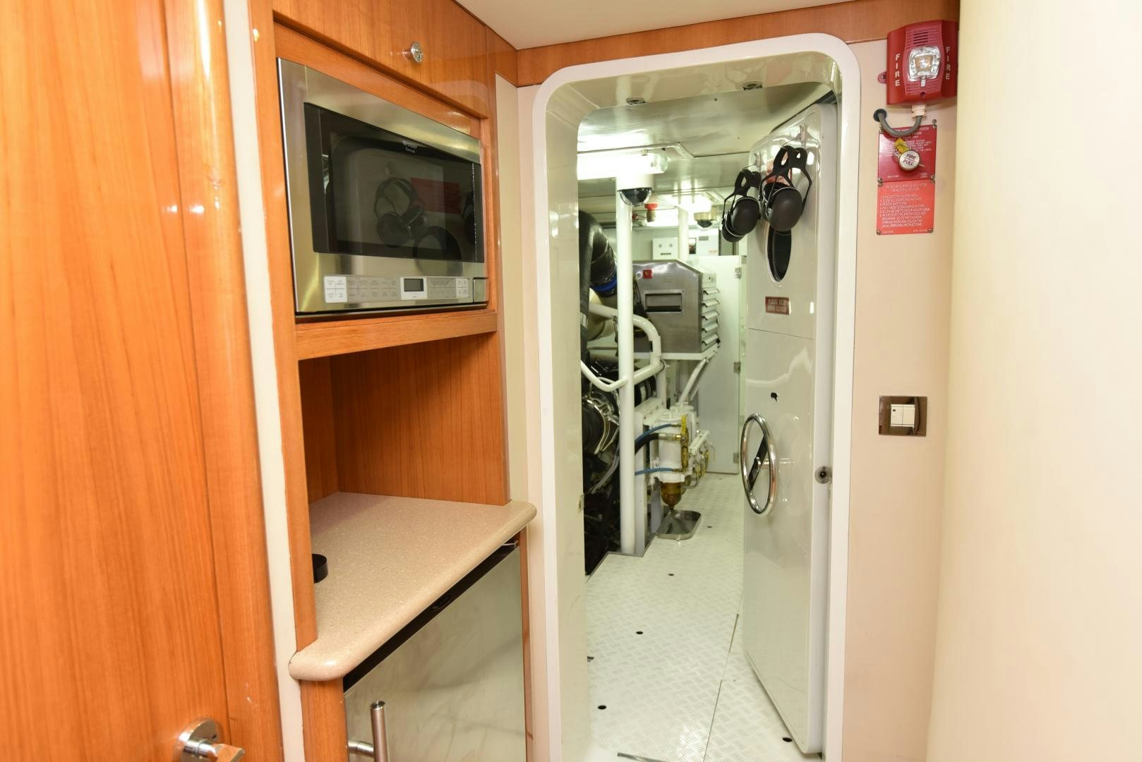 a room with a door and a microwave aboard BLUE STEELE Yacht for Sale
