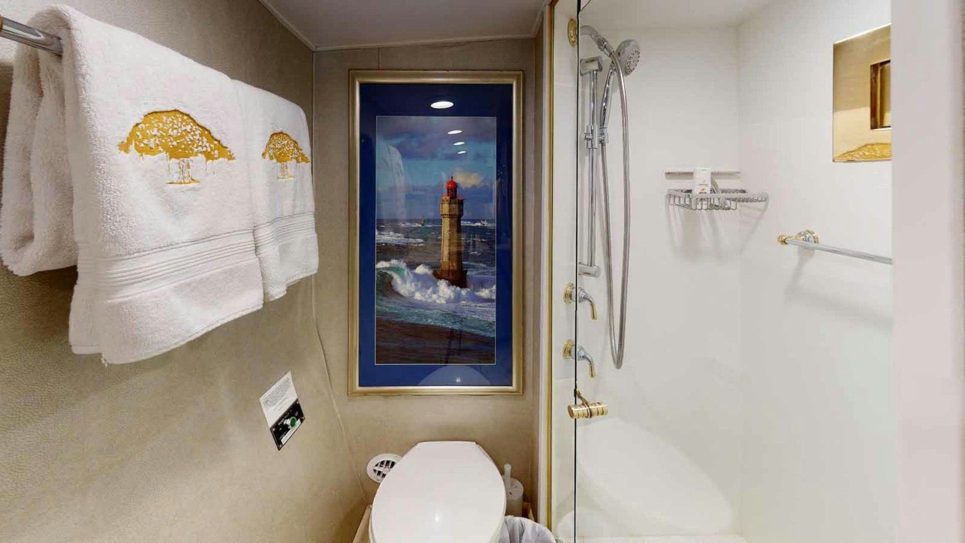 a bathroom with a painting on the wall aboard LORELEI Yacht for Sale