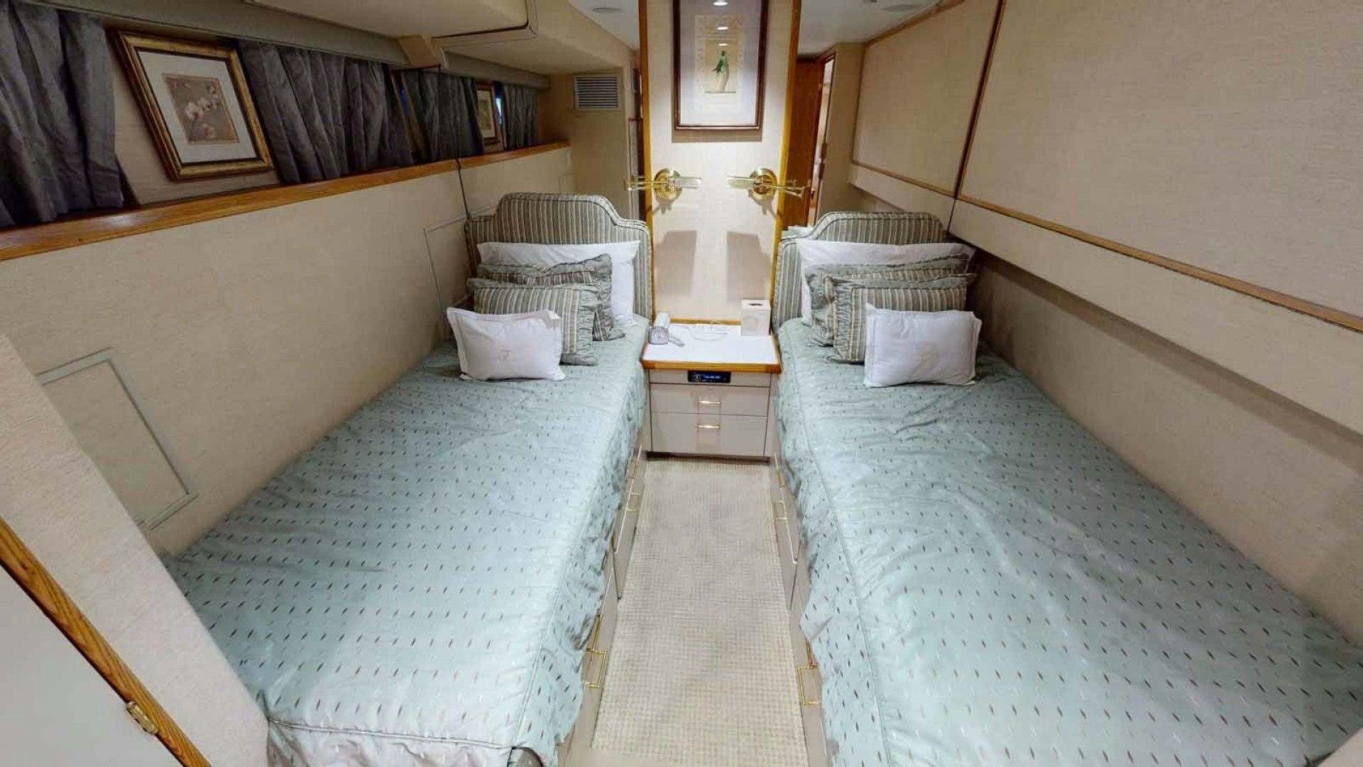 a room with two beds aboard LORELEI Yacht for Sale