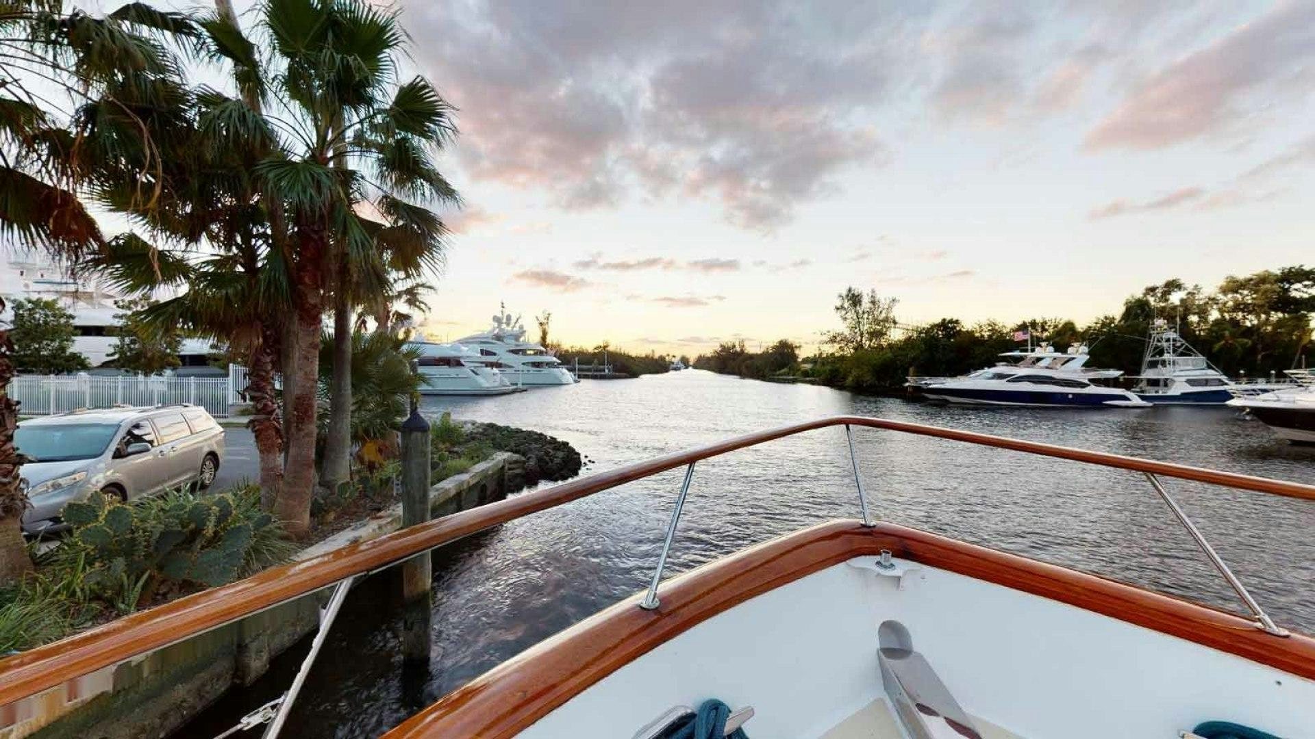 a boat parked on a dock aboard LORELEI Yacht for Sale