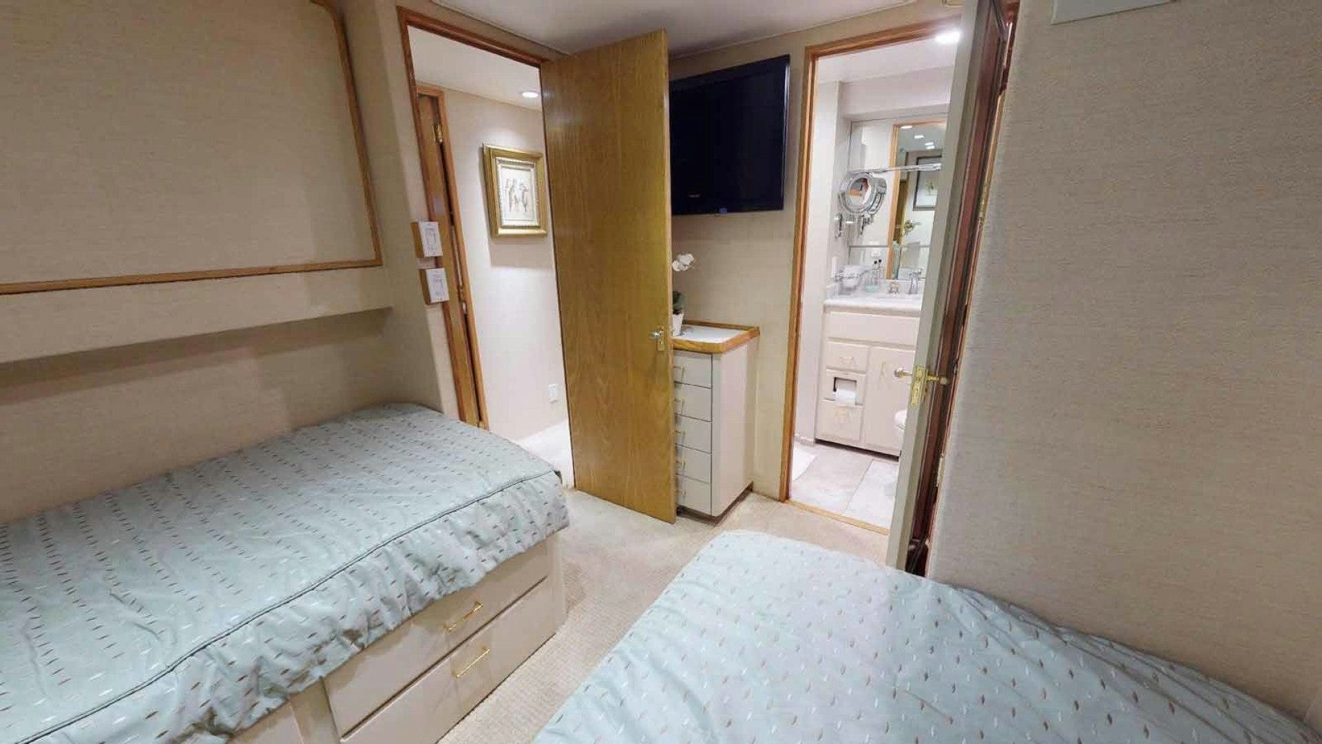 a room with two beds aboard LORELEI Yacht for Sale