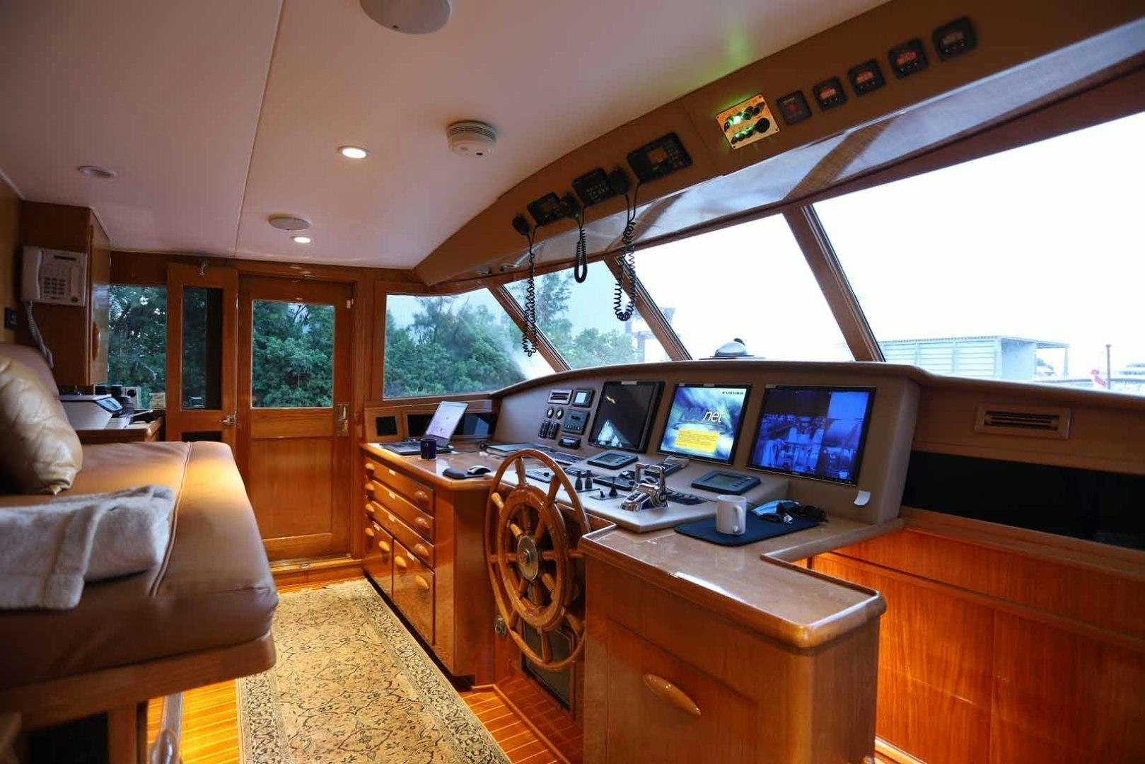 a room with a desk and a computer aboard LORELEI Yacht for Sale