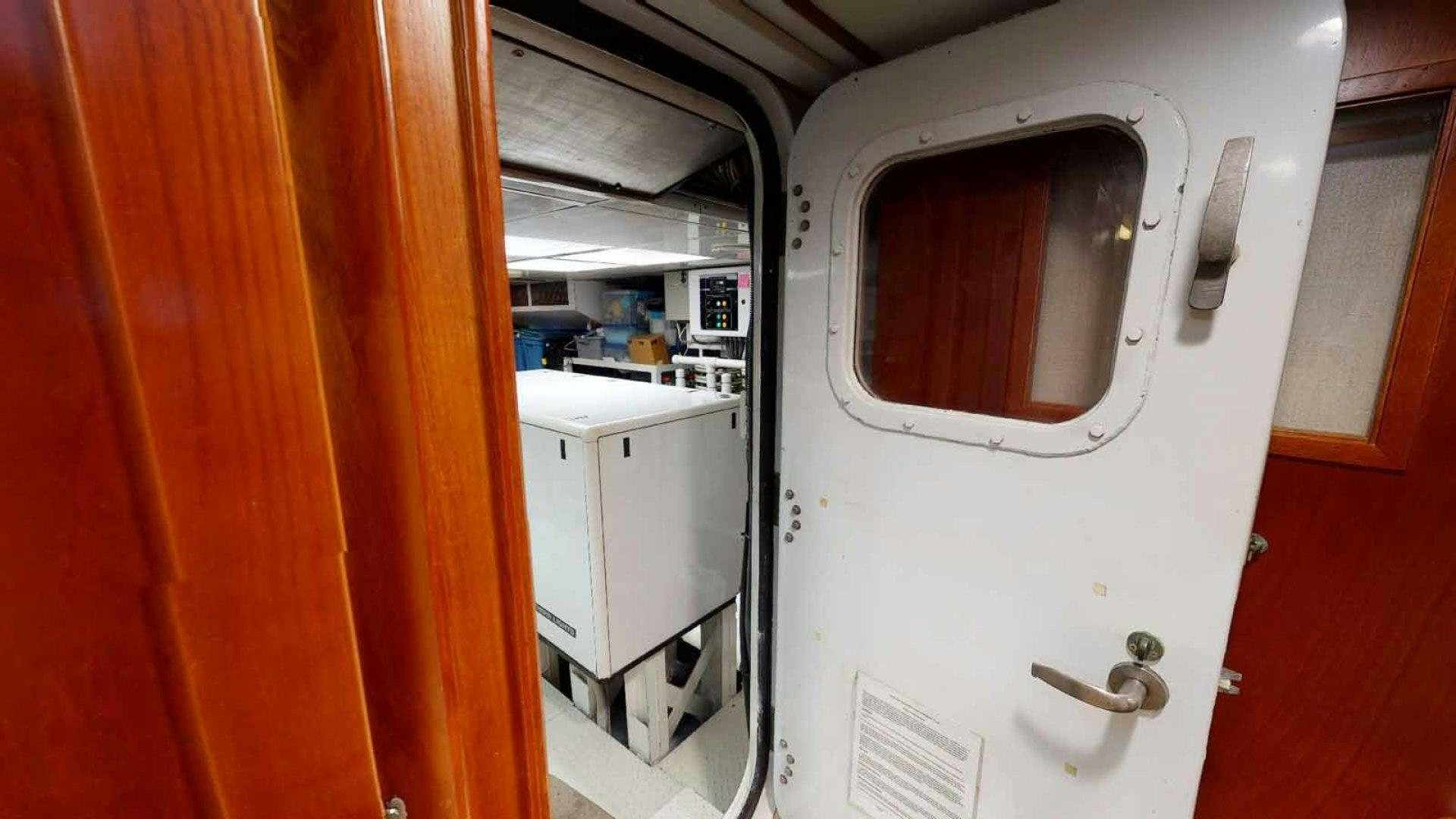 a white machine in a room aboard LORELEI Yacht for Sale