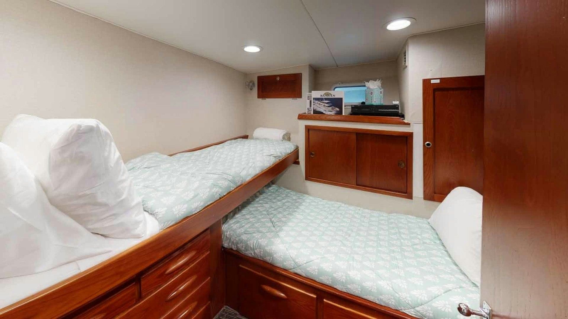 a couple of beds in a room aboard LORELEI Yacht for Sale