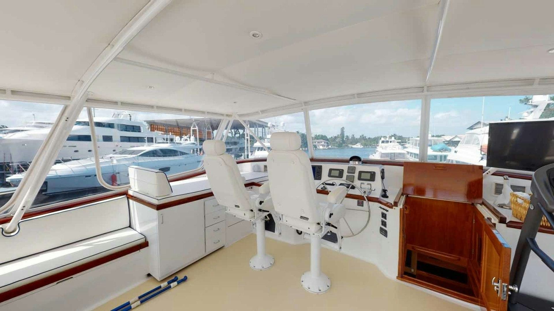 a white chair on a boat aboard LORELEI Yacht for Sale