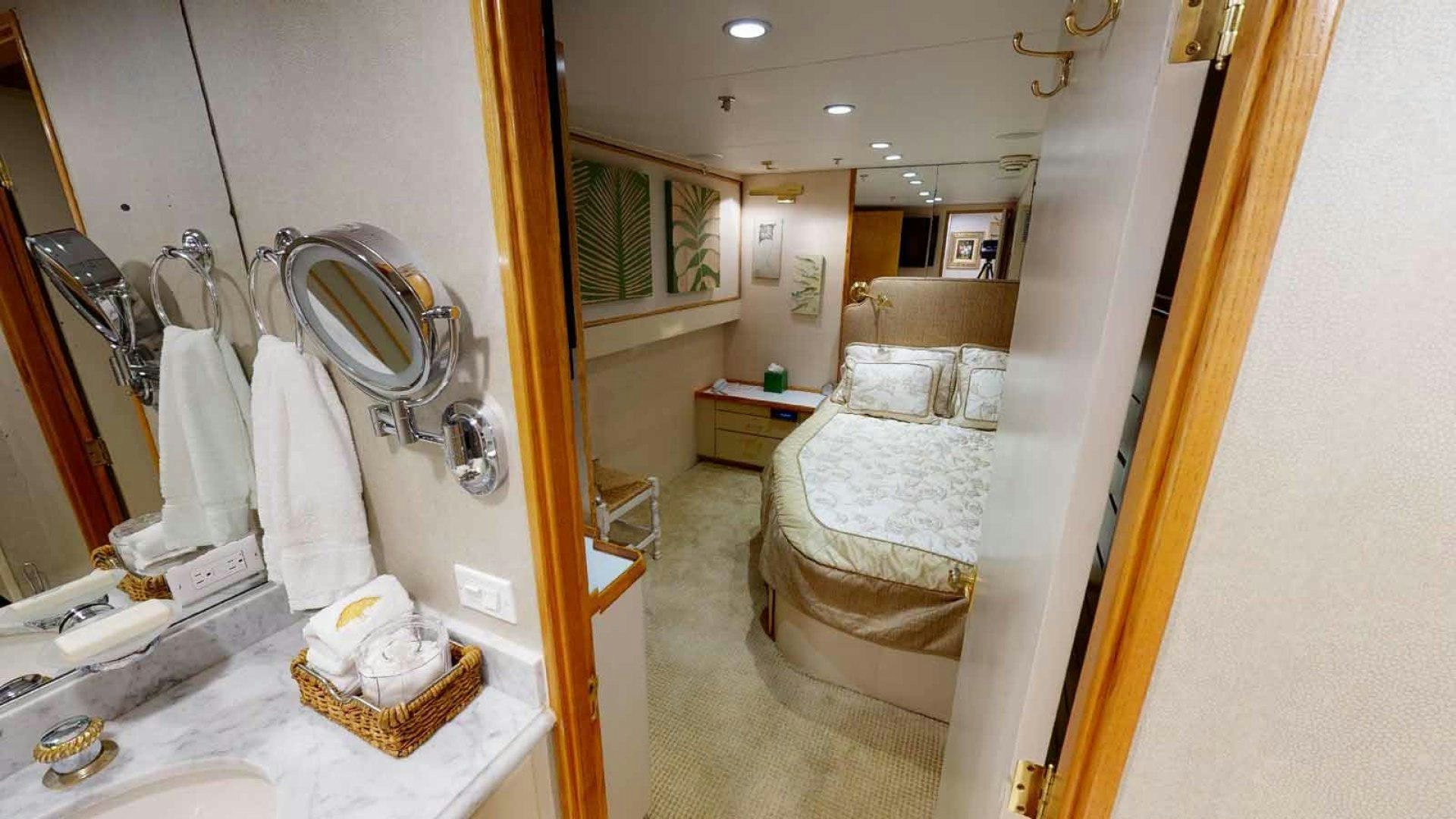 a bathroom with a bed and a mirror aboard LORELEI Yacht for Sale