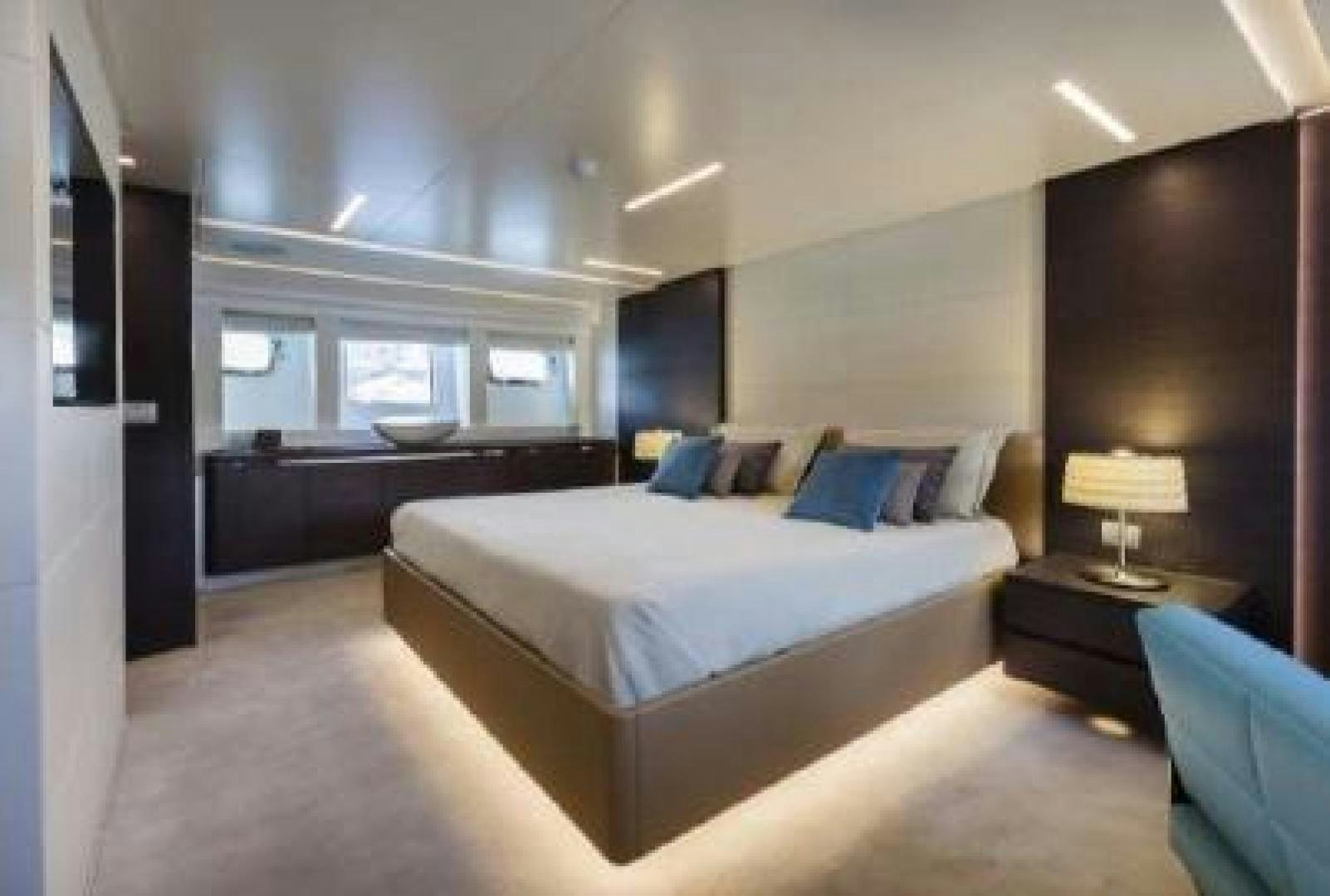 a large bedroom with a large bed aboard No Name Yacht for Sale