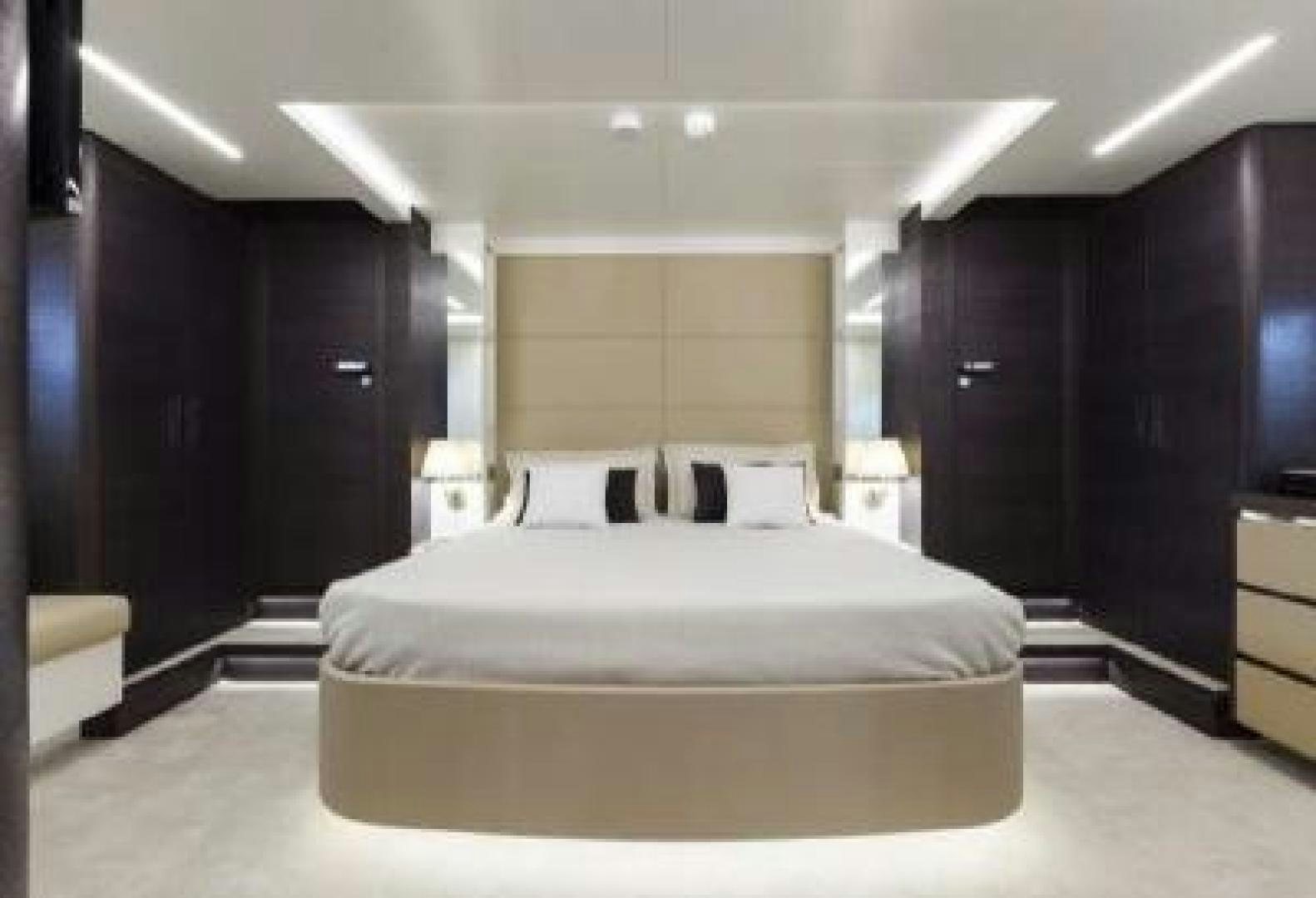 a large bed in a room aboard No Name Yacht for Sale