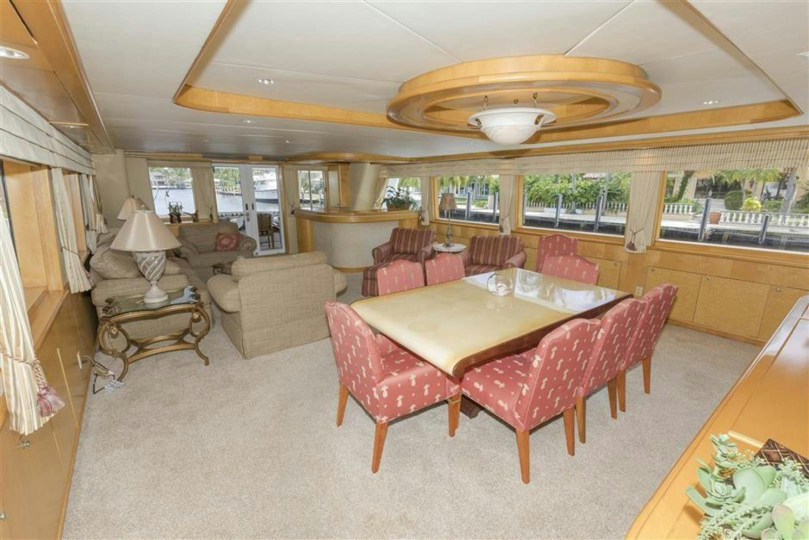 a living room with a large ceiling aboard DETERMINATION Yacht for Sale