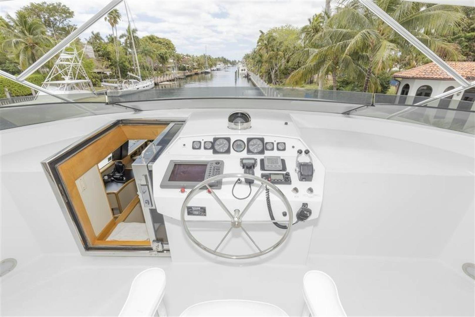 a white car with a white dashboard aboard DETERMINATION Yacht for Sale