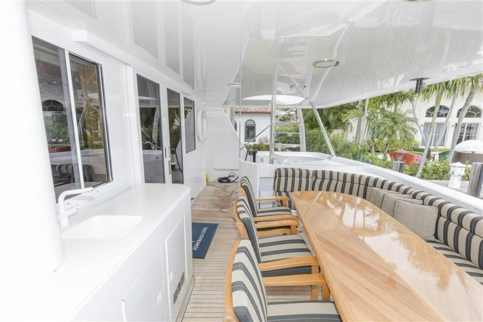 a table and chairs on a deck aboard DETERMINATION Yacht for Sale