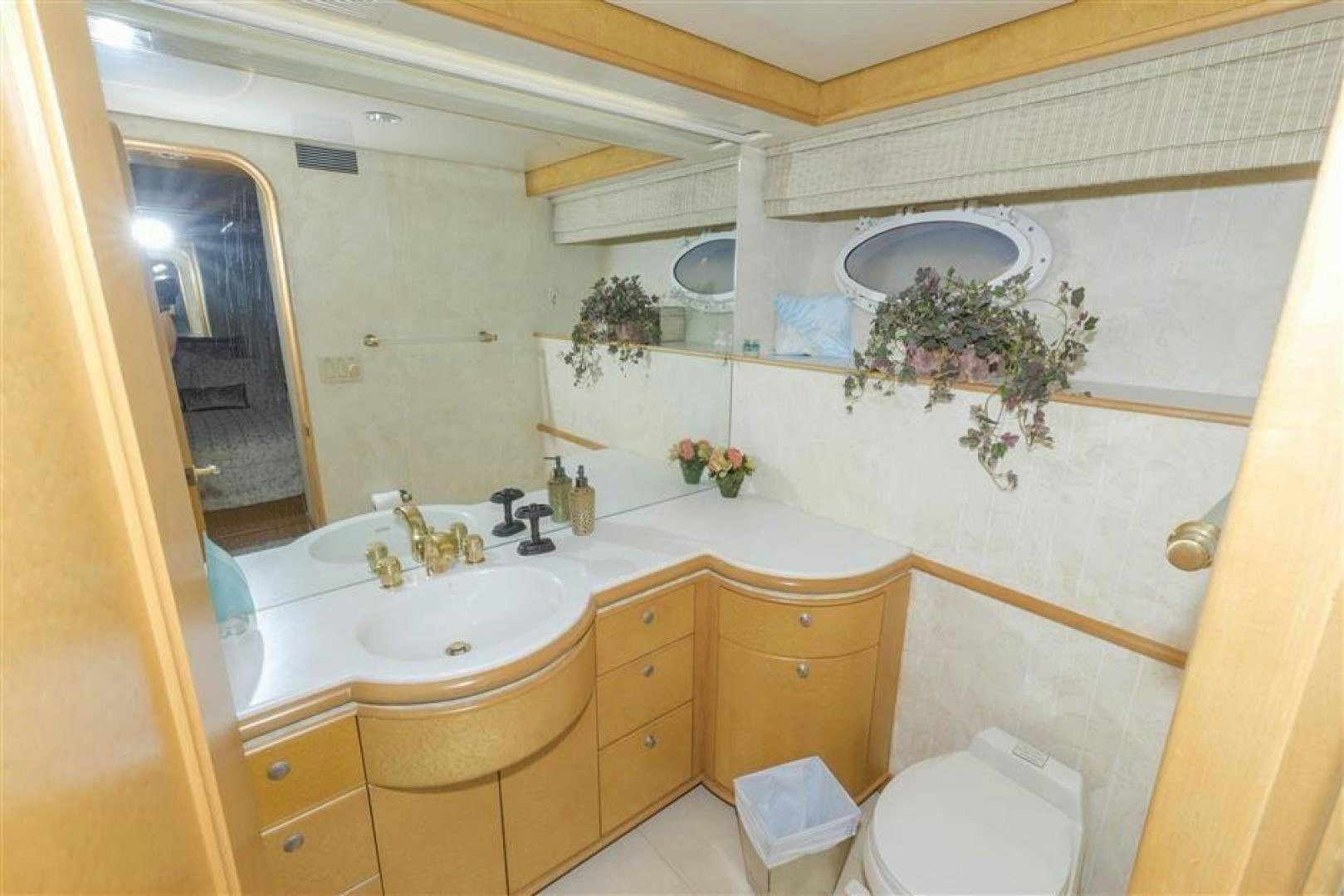 a bathroom with a sink and a toilet aboard DETERMINATION Yacht for Sale