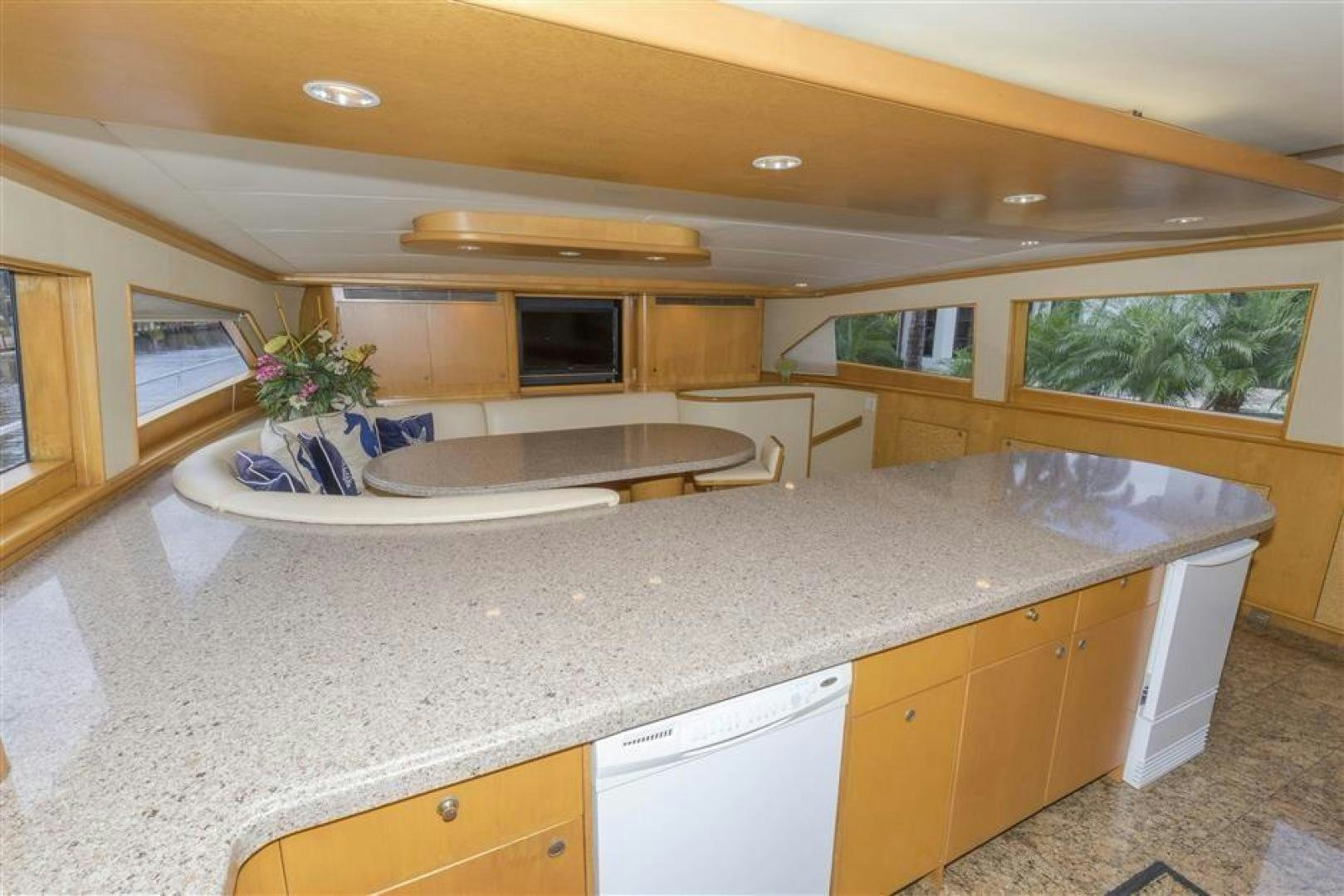 a kitchen with a large island aboard DETERMINATION Yacht for Sale
