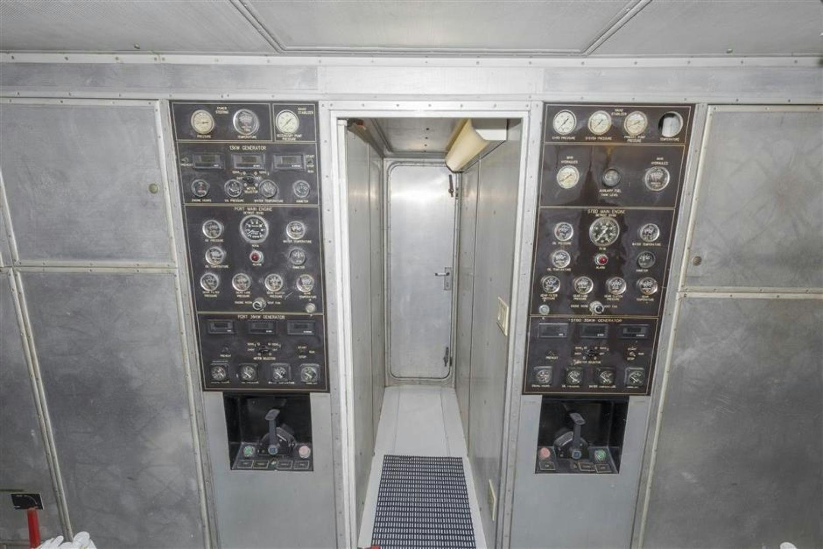a room with a lot of buttons aboard DETERMINATION Yacht for Sale