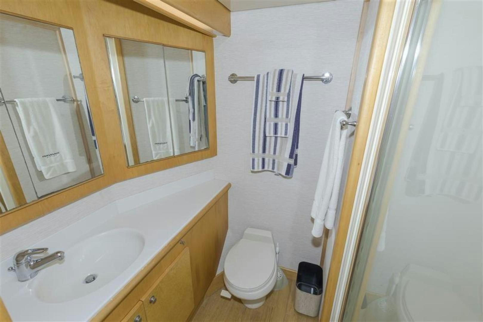 a bathroom with a sink and a toilet aboard DETERMINATION Yacht for Sale