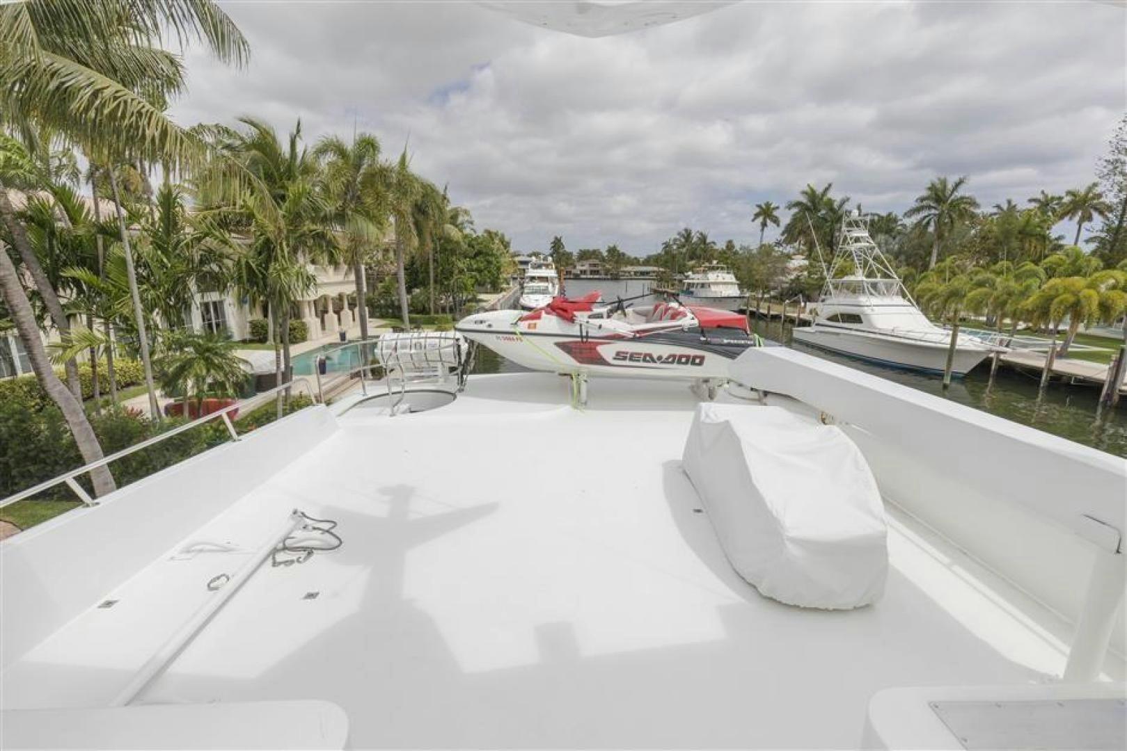 a boat parked on a beach aboard DETERMINATION Yacht for Sale