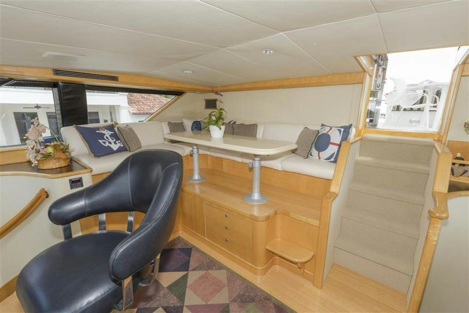 a room with a desk and a bed aboard DETERMINATION Yacht for Sale
