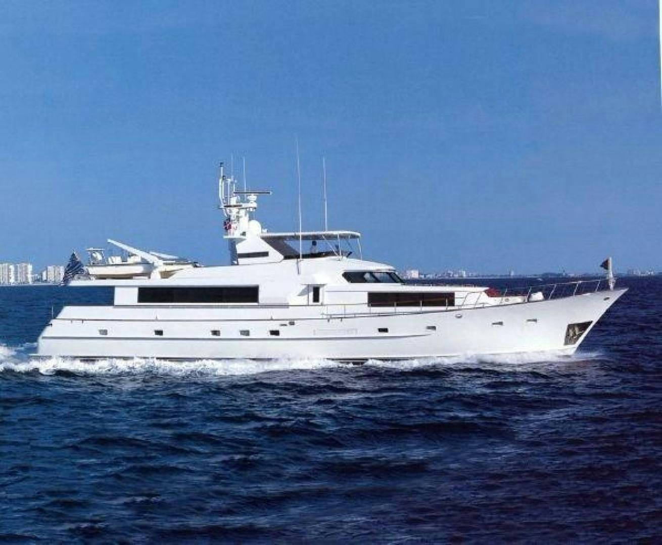 a large white boat in the water aboard LIQUIDITY Yacht for Sale