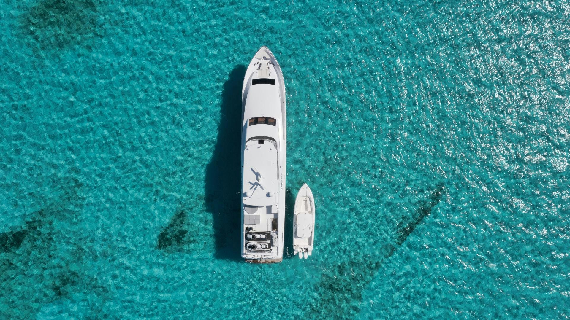 a rocket on a green surface aboard LIMITLESS Yacht for Sale