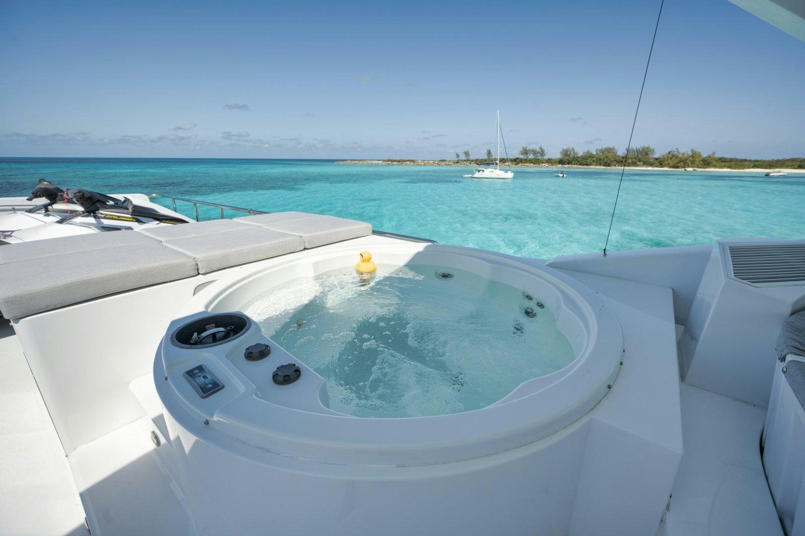 a pool on a boat aboard LIMITLESS Yacht for Sale