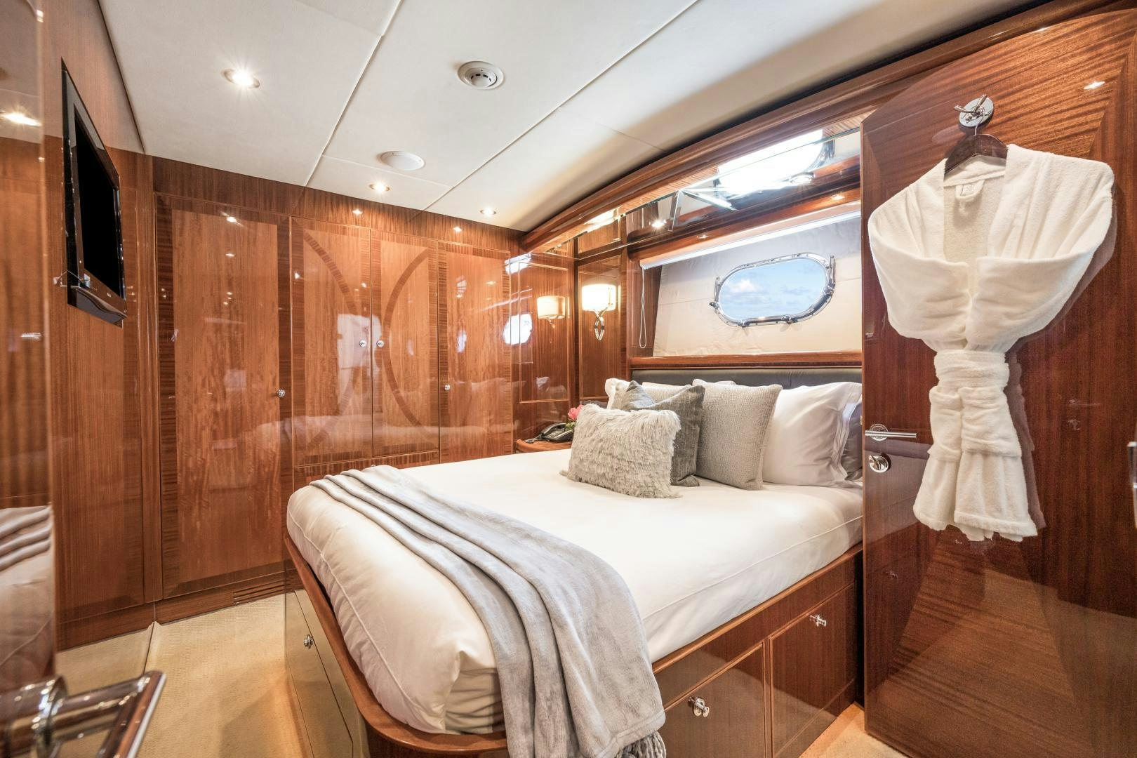 a bed in a room aboard LIMITLESS Yacht for Sale