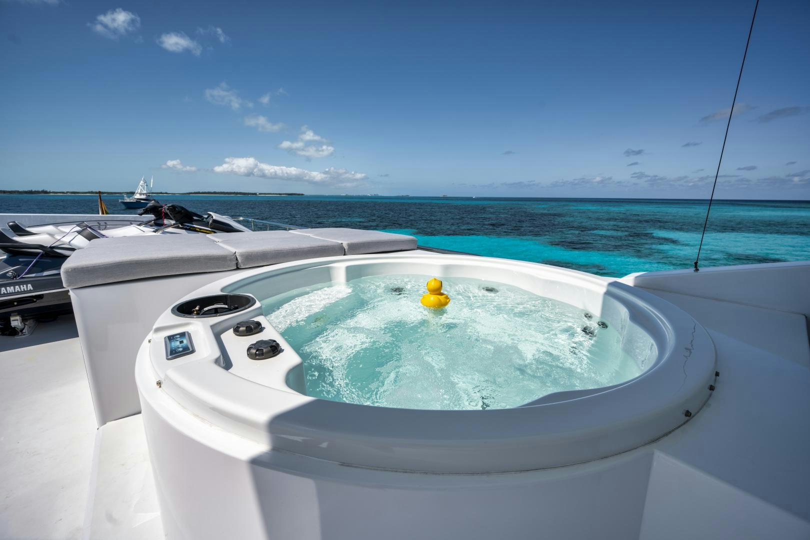 a boat on the water aboard LIMITLESS Yacht for Sale