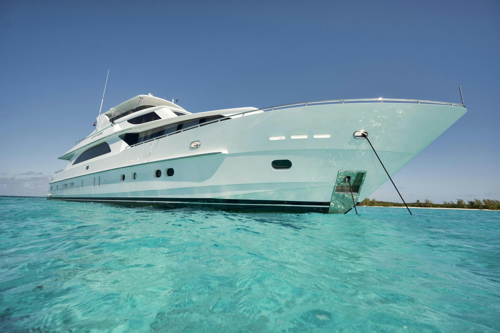 a white yacht in the water aboard LIMITLESS Yacht for Sale